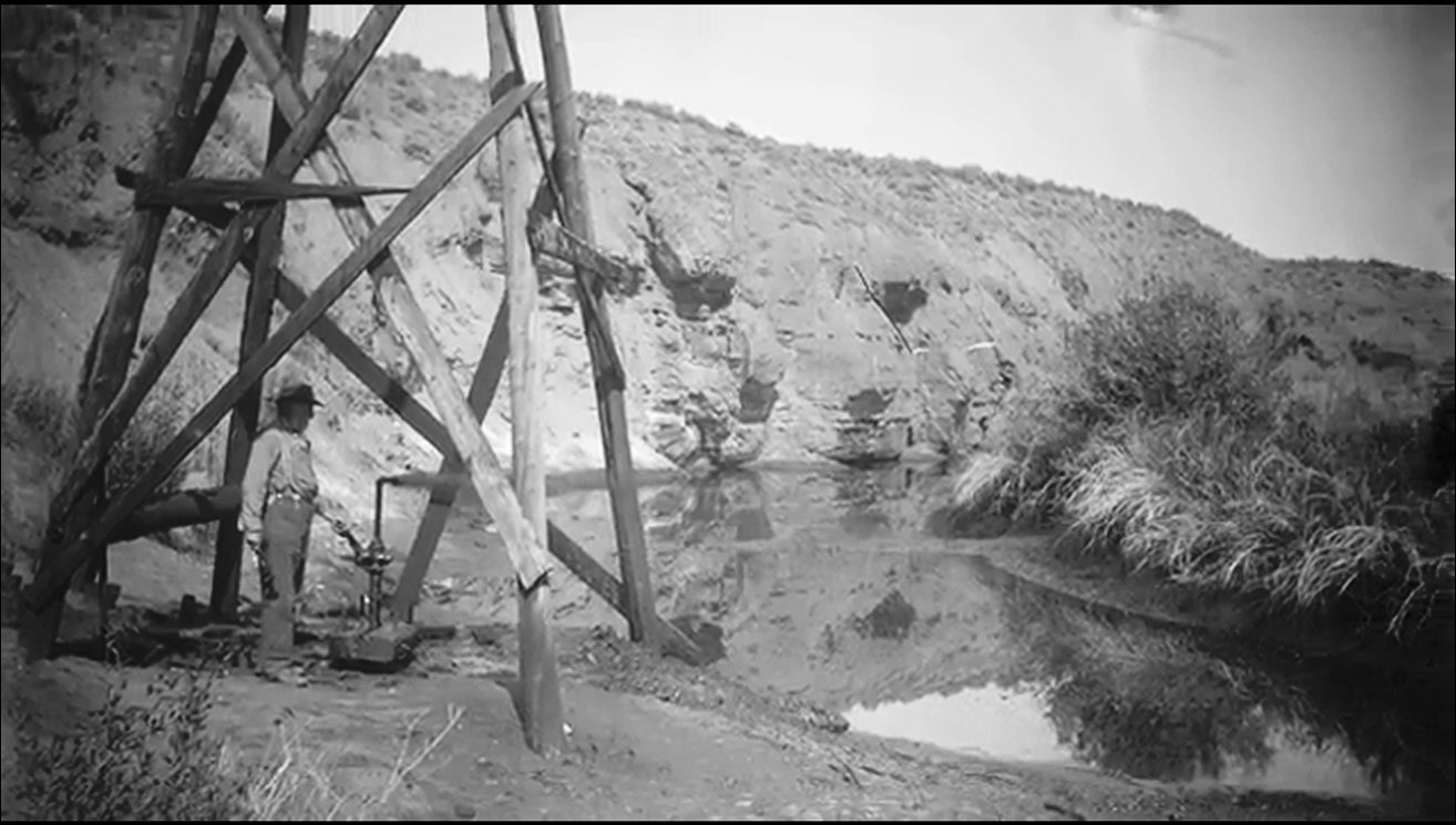 Historic picture of Murphy No. 1 oil well next to 