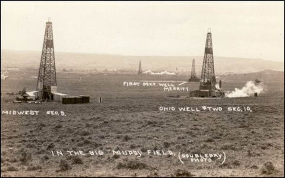 Picture of cable-tool rigs drilling for oil at Big Muddy Oil Field circa 1918, Wyoming