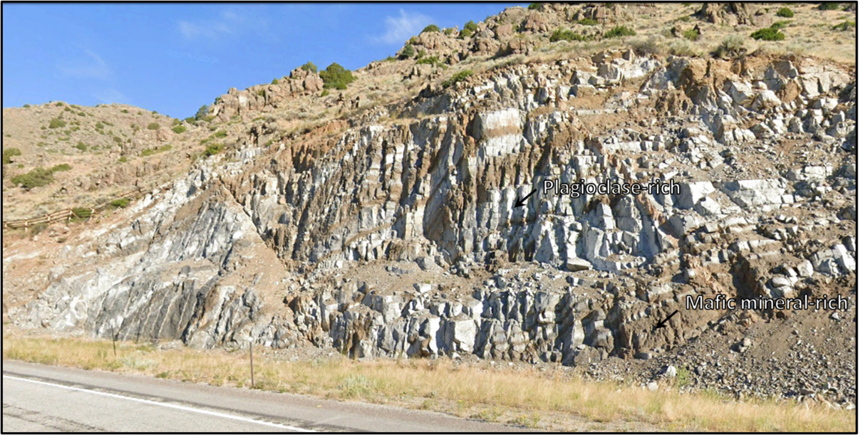Wyoming 34 road cut with compositional layering of Poe Anorthosite, Albany County, Wyoming